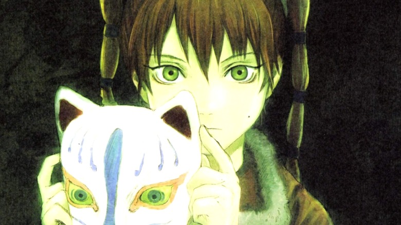 Ran holds up her kitsune mask to shield her prophetic gaze in Texhnolyze