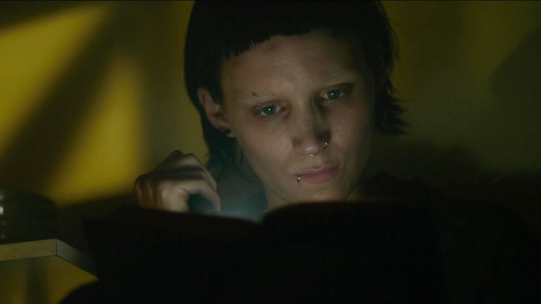 Rooney Mara's Lisbeth Salander works on her laptop in The Girl with the Dragon Tattoo