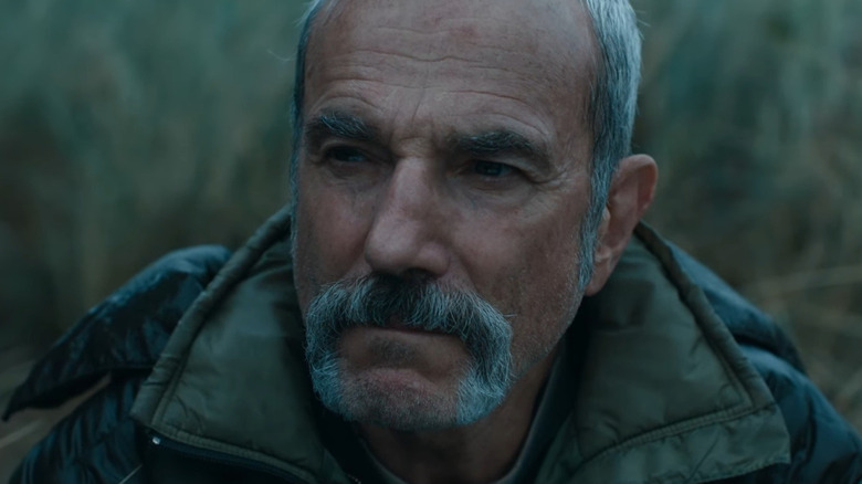 Daniel Day-Lewis looks pensive and gray in a mustache as Ray Stoker in Anemone