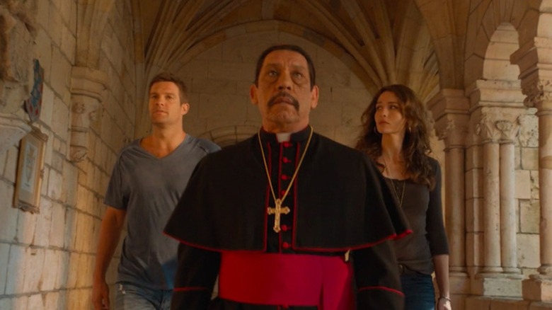Geoff Stults as Walter Sherman and Saffron Burrows as Ike Latulippe drop in on Danny Trejo as Bishop Edward Galano in Bones