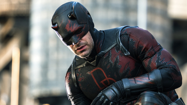 Charlie Cox as Daredevil on a rooftop in Daredevil: Born Again