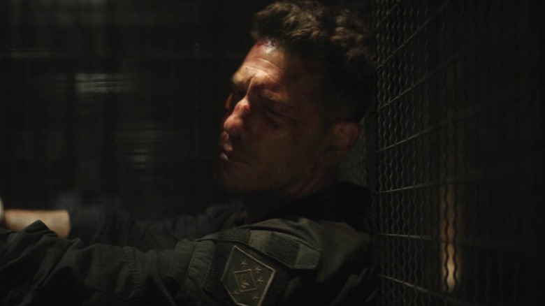 Jon Bernthal as The Punisher in a jail cell in Daredevil: Born Again