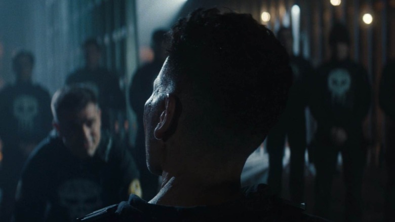 Jon Bernthal as The Punisher surrounded by dirty cops in Daredevil: Born Again