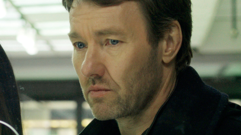 Joel Edgerton as Jason Dessen listening carefully in Dark Matter