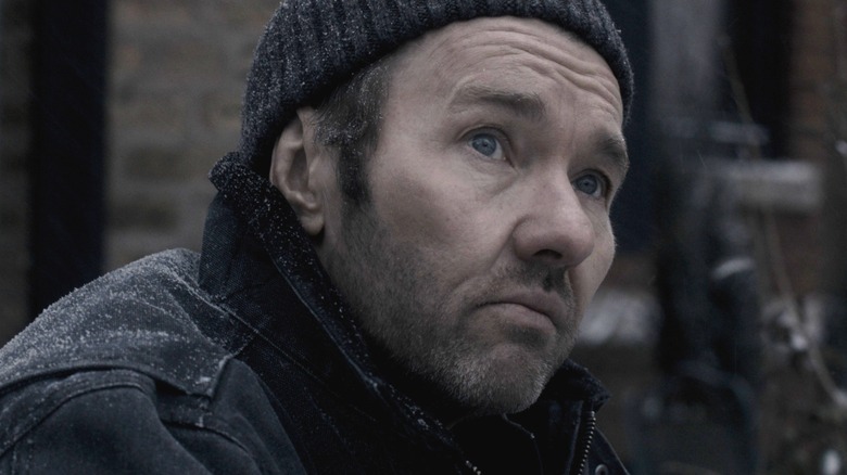 Joel Edgerton as Jason Dessen wearing a heavy winter coat and covered in a dusting of snow in Dark Matter