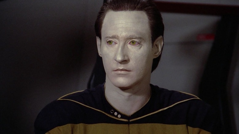 Data seated at a trial on Star Trek: The Next Generation