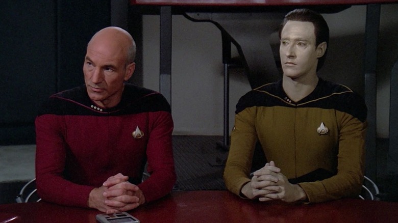 Data and Picard seated at a table on Star Trek: The Next Generation