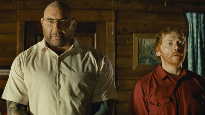 Dave Bautista and Rupert Grint in Knock at the Cabin