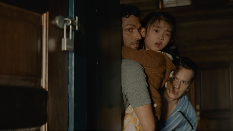 Ben Aldridge, Kristen Cui, and Jonathan Groff in Knock at the Cabin