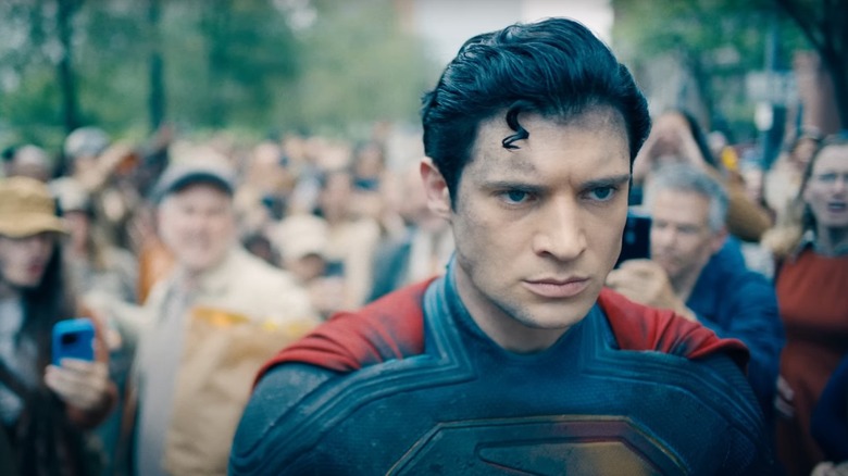 Superman (David Corenswet) dealing with the public fallout from Lex Luthor (Nicholas Hoult) revealing his parents' message in 