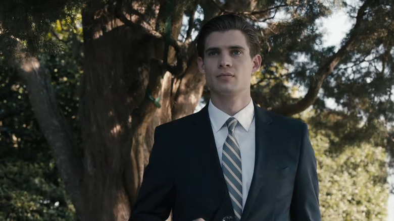 Michael Lawson (David Corenswet) outside wearing suit in Affairs of State