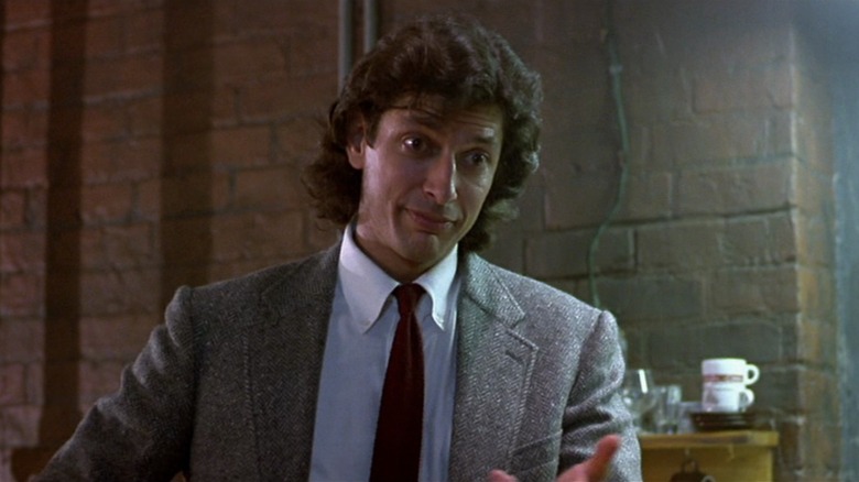 Geena Davis and the Brundlefly in The Fly.