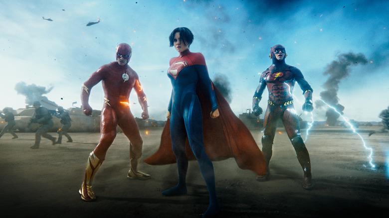 Both Flashes standing by Supergirl during the final battle in The Flash (2023)