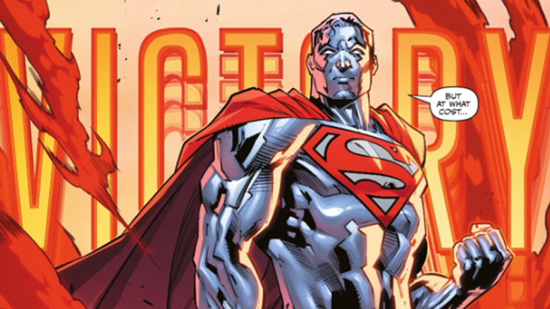 A super-charged Superman holds up a fist against after claiming victory in a panel from DC K.O. Superman vs. Captain Atom #1