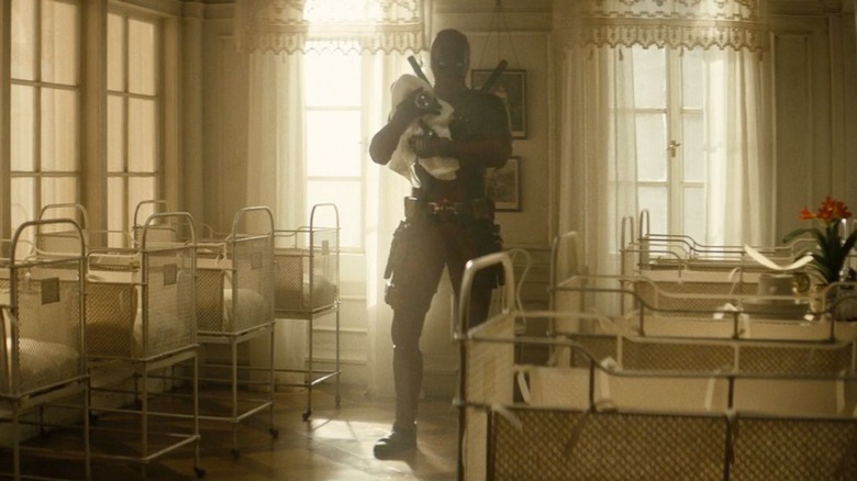 Wade looks at Baby Hitler in Deadpool 2