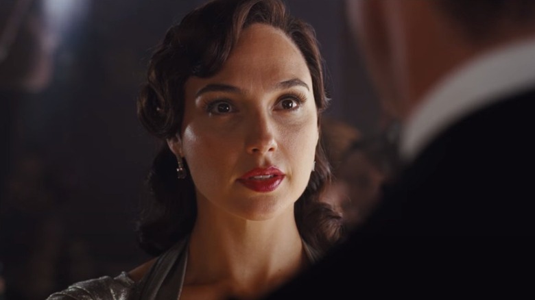 Gal Gadot looks at man