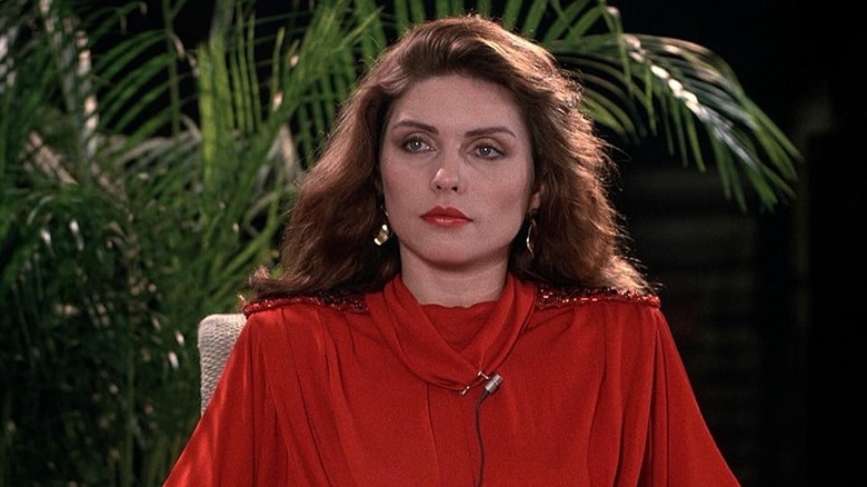 Debbie Harry slays in red as Nicki Brand in Videodrome