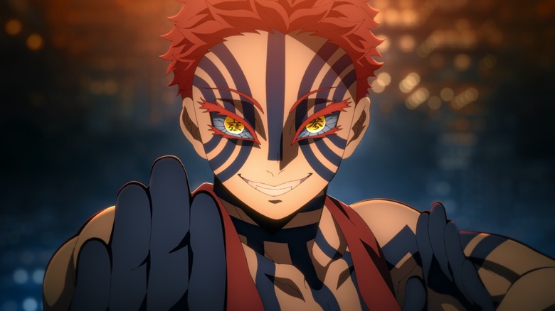 Akaza miles as he prepares for an attack in Demon Slayer: Infinity Castle