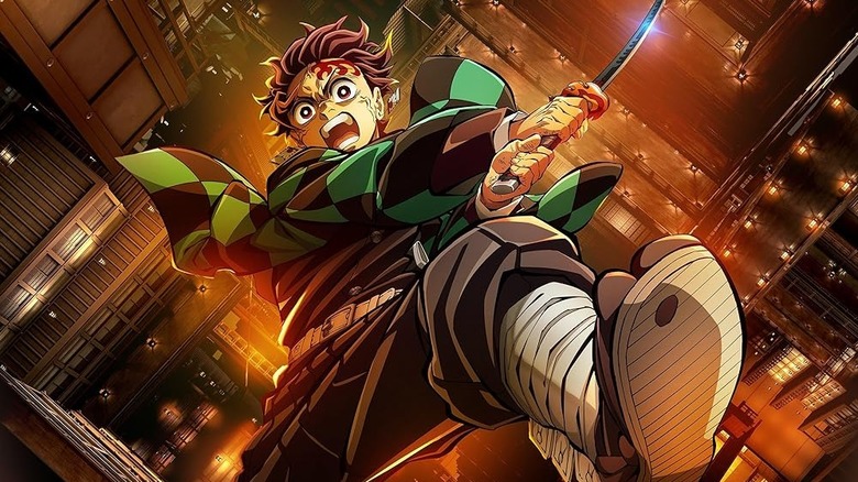 Tanjiro swinging his sword on the poster for Demon Slayer: Kimetsu no Yaiba — Infinity Castle