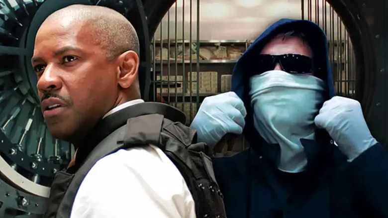 Denzel Washington as Detective Keith Frazier in police uniform stands next to Clive Owen as Dalton Russell, who wears a mask and sunglasses, with an open bank vault in the background in Inside Man