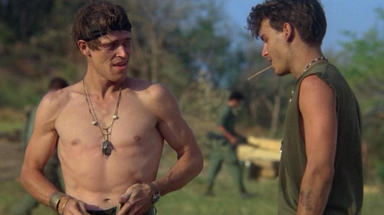 Willem Dafoe as Sergeant Elias and a young Johnny Depp in Platoon