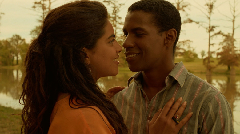Sarita Choudury as Mina and Denzel Washington as Demetrius share a warm embrace in Mississippi Masala