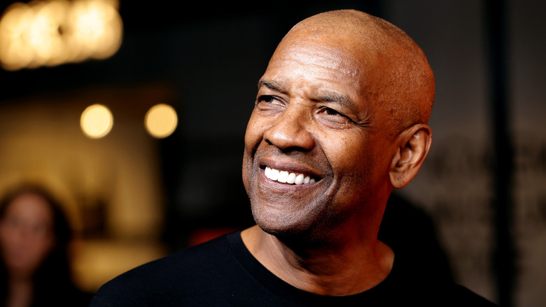 Denzel Washington smiling at a public event