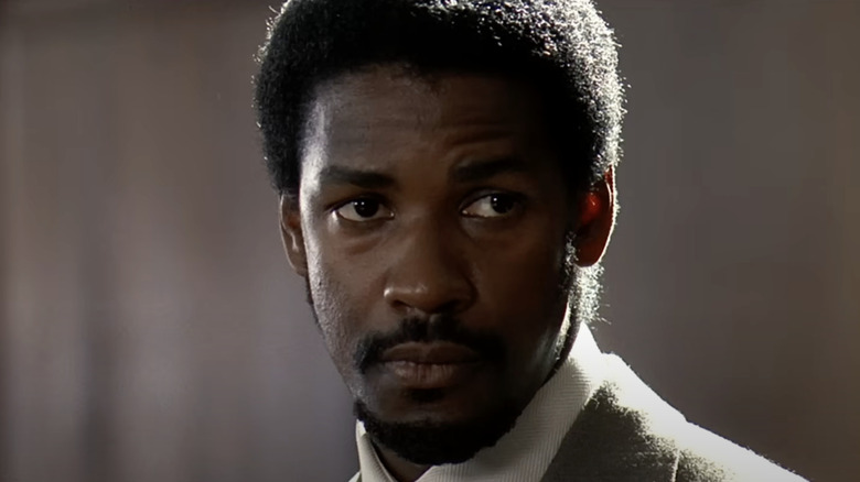 Denzel Washington in the role of Steve Picot seems skeptical of freedom of crying