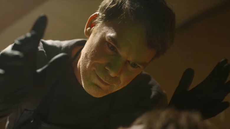 Dexter hovering over a victim in 