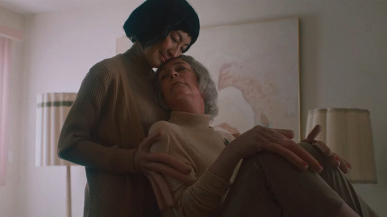 Evelyn (Michelle Yeoh) embraces Deirdre (Jamie Lee Curtis) in Everything Everywhere All At Once