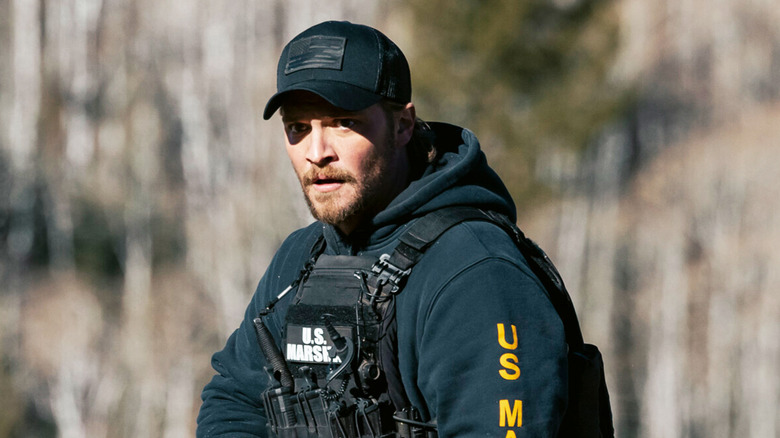 Luke Grime's Kayce Marshal runs through a wooded area in Marshals