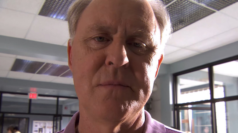 Arthur Mitchell looking at Dexter Morgan in Dexter