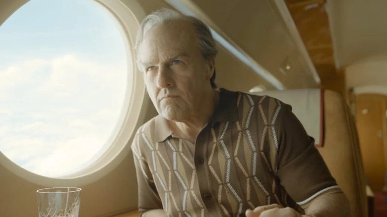 Digger scowls on a plane in Digger