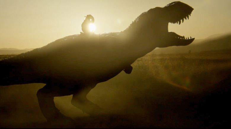 A cowboy riding a T-rex in Dinosaurs of the Wild West