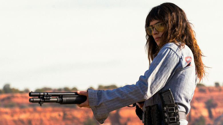 Celeste stares down her target while holding a shotgun in Onslaught