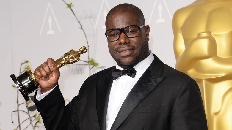 Steve McQueen holding Oscar