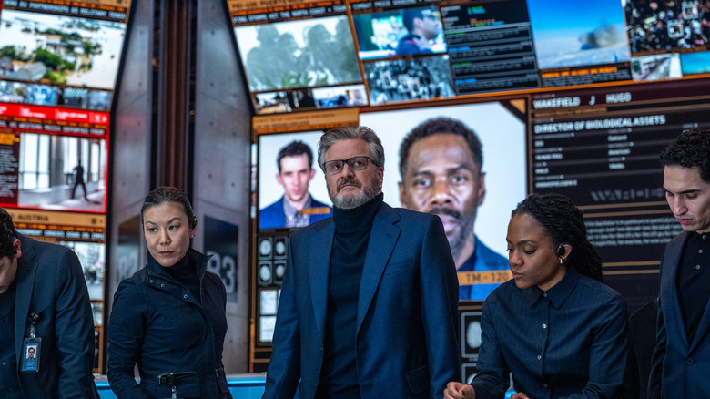 Noah and his WARDEX goons in their control room in Disclosure Day