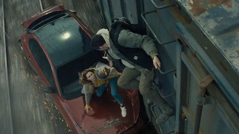 Margaret and Daniel in the train scene in Disclosure Day