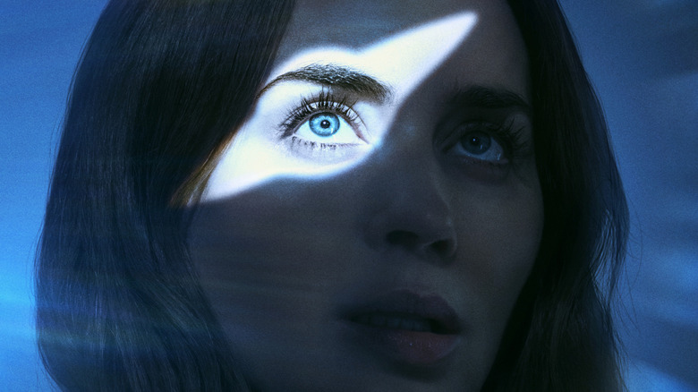 Emily Blunt as Margaret with a flying saucer on her face on a poster for Disclosure Day