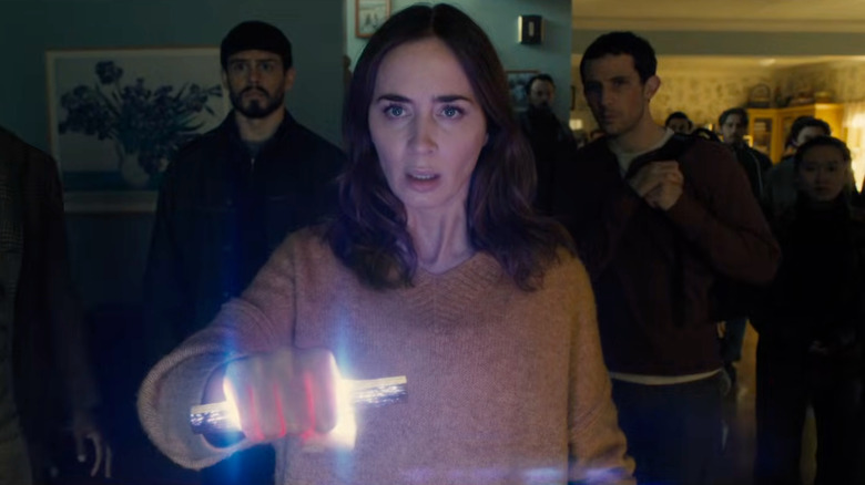 Margaret holding The Device with Santiago and Daniel behind her in Disclosure Day