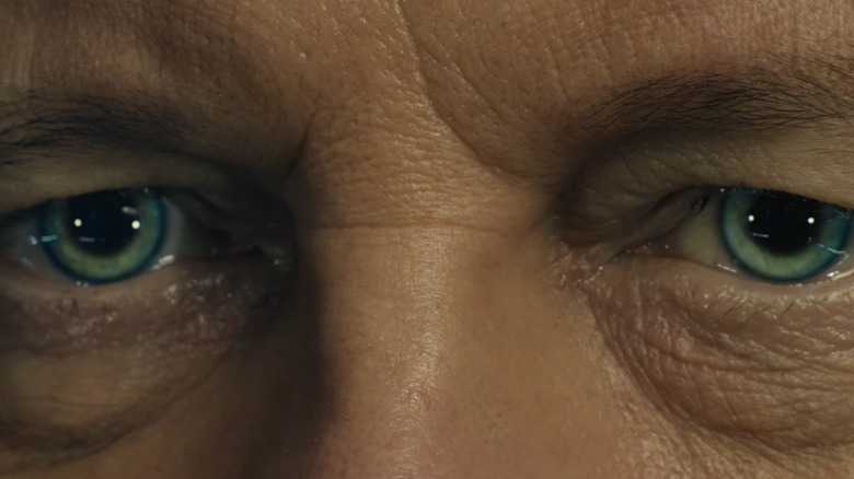 Close-up of eye pupils narrowing in Disclosure Day