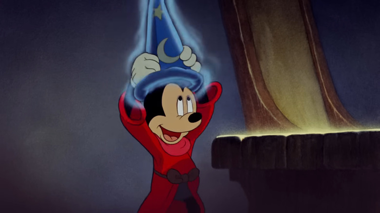 Mickey Mouse puts on his sorcerer had
