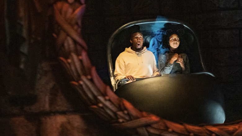 Haunted Mansion people riding