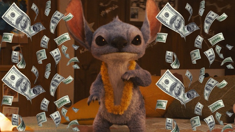 Stitch standing on a bed surrounded by money in Lilo & Stitch