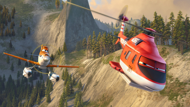 The soil guard and the blade fly over a forest in the planes: fire and rescue