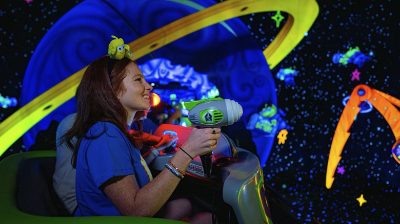A person riding Buzz Lightyear's Space Ranger Spin