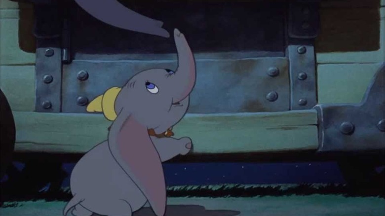 Jumbo Jr. getting comforted by his mother in "Dumbo"