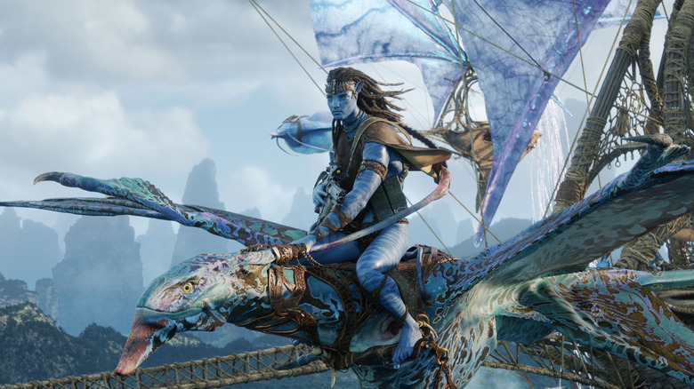 Jake Sully flying on his ikran alongside the windtraders in Avatar: Fire and Ash