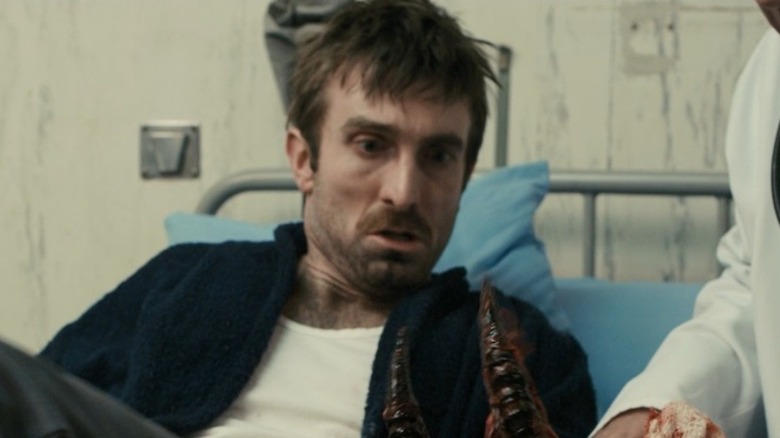 Wikus with alien hand