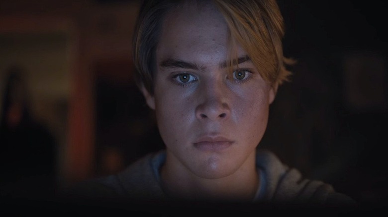 I See You's Connor staring at laptop screen